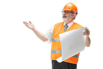 Image showing The builder in orange helmet isolated on white