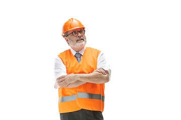 Image showing The builder in orange helmet isolated on white