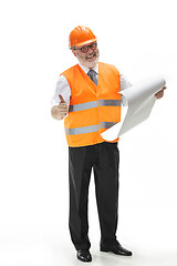 Image showing The builder in orange helmet isolated on white