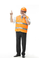 Image showing The builder in orange helmet isolated on white