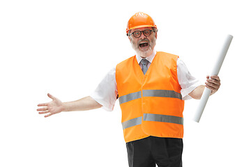 Image showing The builder in orange helmet isolated on white