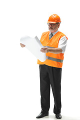 Image showing The builder in orange helmet isolated on white