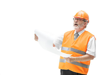 Image showing The builder in orange helmet isolated on white