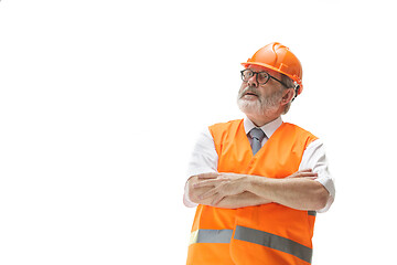 Image showing The builder in orange helmet isolated on white