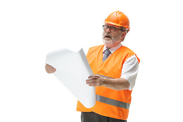 Image showing The builder in orange helmet isolated on white