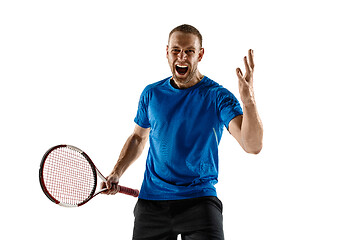 Image showing Portrait of a handsome male tennis player celebrating his success isolated on a white background