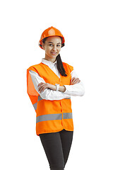 Image showing The female builder in orange helmet isolated on white