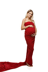 Image showing Pregnant girl in red dress