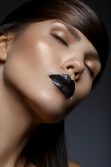 Image showing beautiful girl with black lips