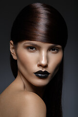 Image showing beautiful girl with black lips