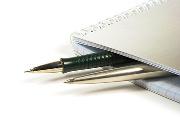 Image showing blank notebook and two pens