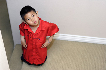Image showing Cute kid in red