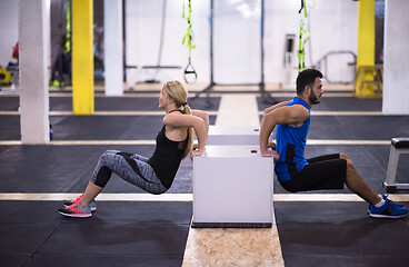 Image showing athletes working out their arms