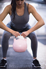 Image showing woman exercise with fitness kettlebell