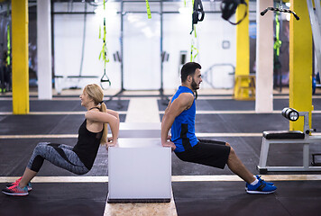 Image showing athletes working out their arms