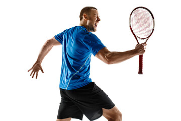 Image showing Portrait of a handsome male tennis player celebrating his success isolated on a white background