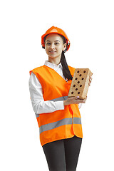 Image showing The female builder in orange helmet isolated on white