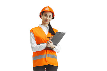 Image showing The female builder in orange helmet isolated on white