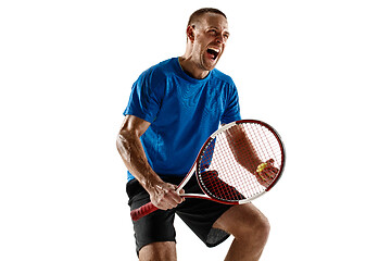 Image showing Portrait of a handsome male tennis player celebrating his success isolated on a white background