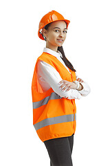 Image showing The female builder in orange helmet isolated on white