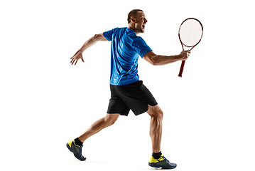 Image showing Portrait of a handsome male tennis player celebrating his success isolated on a white background