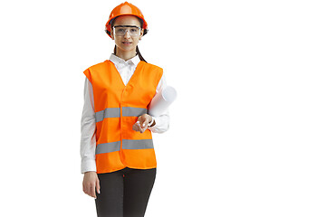 Image showing The female builder in orange helmet isolated on white