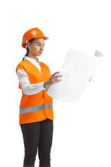 Image showing The female builder in orange helmet isolated on white