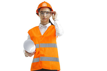 Image showing The female builder in orange helmet isolated on white