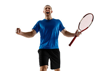 Image showing Portrait of a handsome male tennis player celebrating his success isolated on a white background