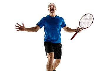 Image showing Portrait of a handsome male tennis player celebrating his success isolated on a white background