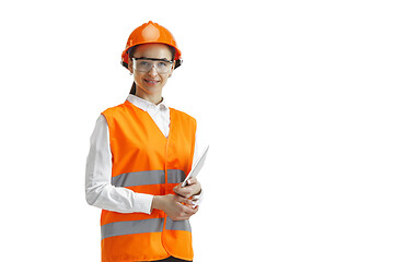 Image showing The female builder in orange helmet isolated on white