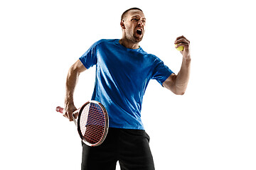 Image showing Portrait of a handsome male tennis player celebrating his success isolated on a white background