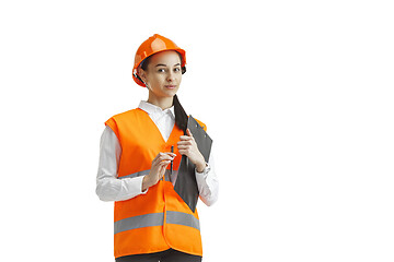 Image showing The female builder in orange helmet isolated on white