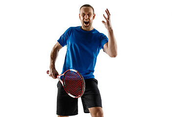 Image showing Portrait of a handsome male tennis player celebrating his success isolated on a white background