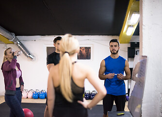 Image showing athletes getting instructions from trainer