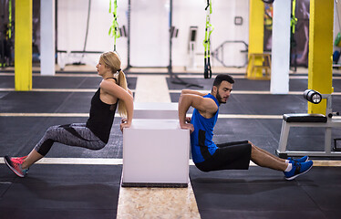 Image showing athletes working out their arms