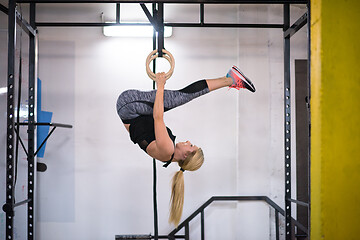 Image showing woman working out on gymnastic rings