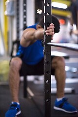 Image showing man doing pull ups on the vertical bar