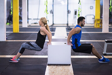 Image showing athletes working out their arms