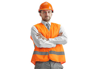 Image showing The builder in orange helmet isolated on white