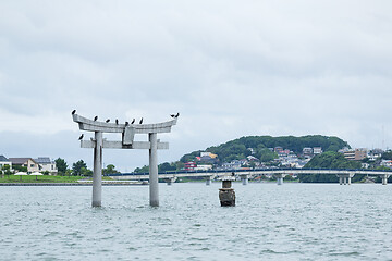 Image showing Stone torii with water in Fukuoka city