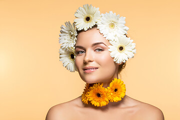 Image showing beautiful girl with white and yellow flowers 