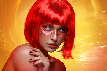 Image showing Beautiful girl in red wig