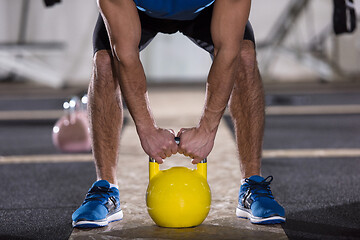 Image showing man exercise with fitness kettlebell