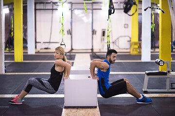 Image showing athletes working out their arms