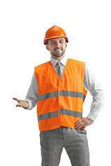 Image showing The builder in orange helmet isolated on white