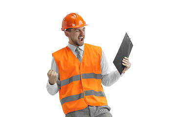 Image showing The builder in orange helmet isolated on white