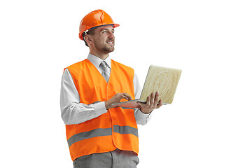 Image showing The builder in orange helmet isolated on white