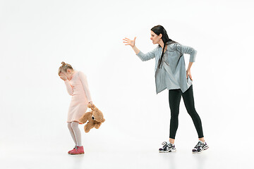 Image showing Angry mother scolding her daughter at home