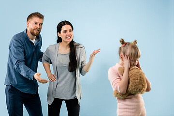 Image showing Angry parents scolding their daughter at home